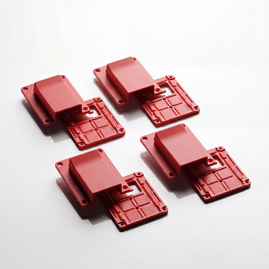 Red nylon Anderson plug cover and base shown side by side