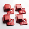 Four red nylon 50A Anderson plug mount covers and bases